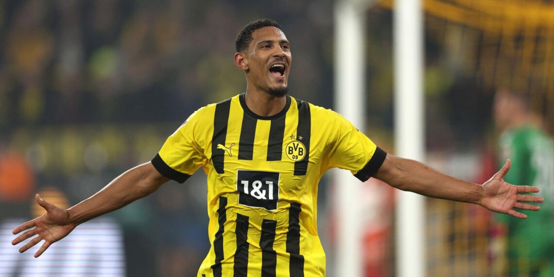 Haller’s double lifts Dortmund to top of Bundesliga