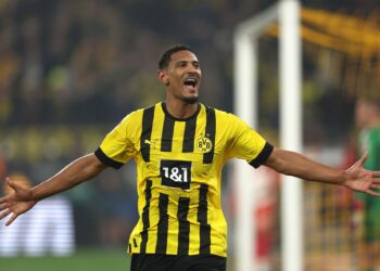 Haller’s double lifts Dortmund to top of Bundesliga