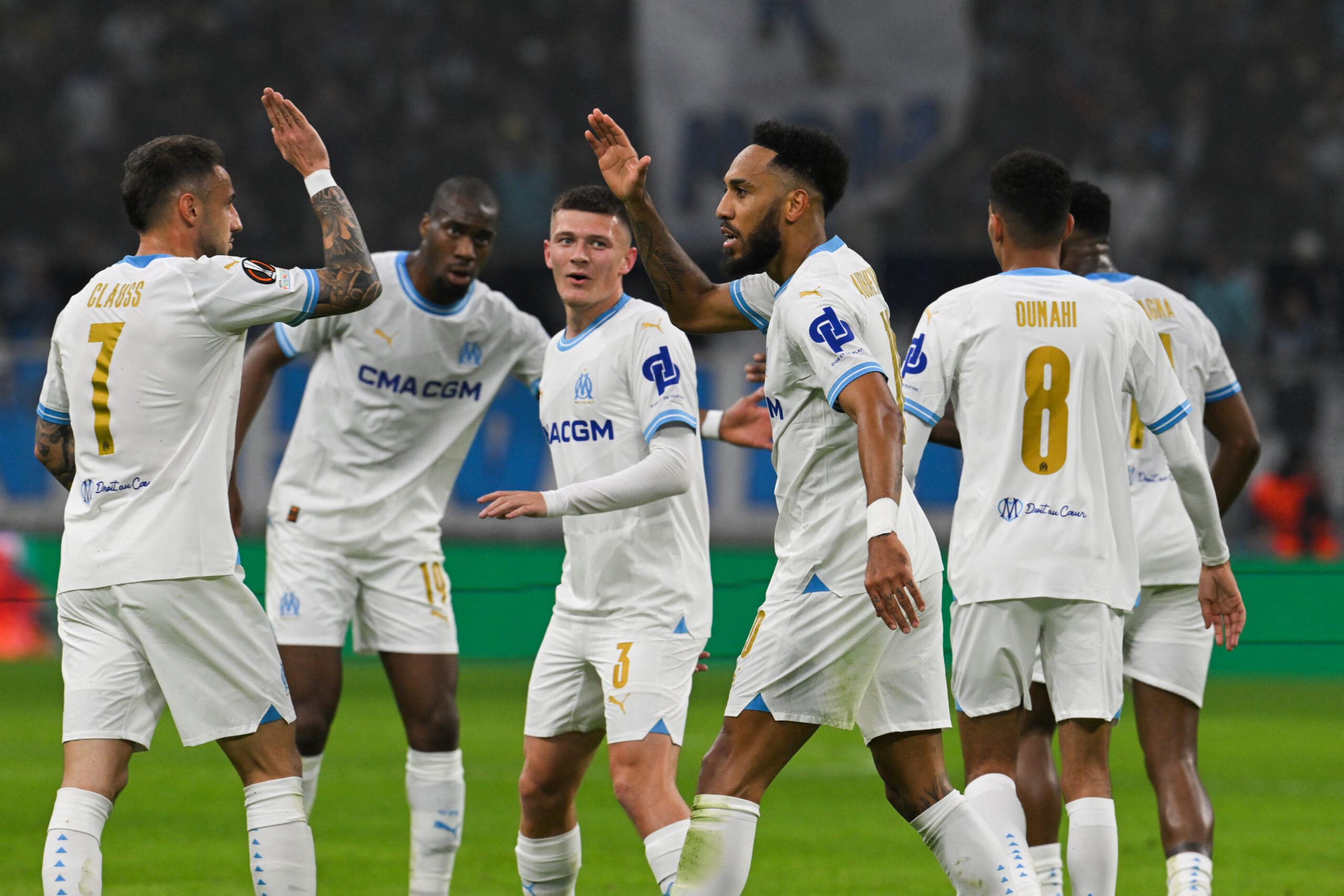 Gabonese forward #10 Pierre-Emerick Aubameyang (C) celebrates scoring his team's first goal during the UEFA Europa League knockout round play-off second leg football match between Olympique de Marseille and Shakhtar Donetsk at the Velodrome Stadium in Marseille, southern France, on February 22, 2024. 