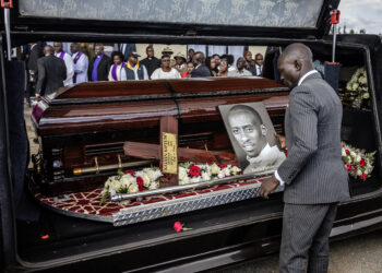 President of the International Athletics Federation Sebastian Coe (2nd R) looks on while attending the funeral proceedings of the late marathon runner Kelvin Kiptum in Chepkorio on February 23, 2024.