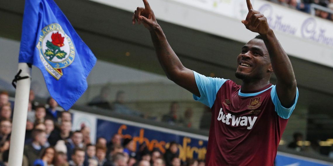 West Ham United's Nigerian striker Emmanuel Emenike celebrates scoring their fourth goal during the FA cup fifth round football match between Blackburn Rovers and West Ham United at Ewood Park in Blackburn, north west England on February 21, 2016. West Ham won the game 5-1.