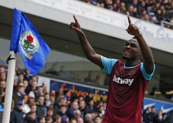 West Ham United's Nigerian striker Emmanuel Emenike celebrates scoring their fourth goal during the FA cup fifth round football match between Blackburn Rovers and West Ham United at Ewood Park in Blackburn, north west England on February 21, 2016. West Ham won the game 5-1.