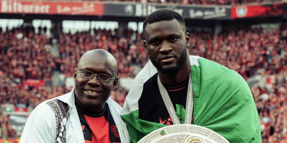 Boniface shows off childhood coach in Bundesliga title party