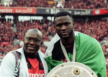 Boniface shows off childhood coach in Bundesliga title party