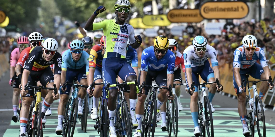Wanty team's Eritrean rider Biniam Girmay (C) cycles to the finish line ahead of second-placed Movistar Team's Colombian rider Fernando Gaviria (3rd R) and third-placed Lotto Dstny team's Belgian rider Arnaud De Lie (L) to win the 3rd stage of the 111th edition of the Tour de France cycling race, 230,5 km between Piacenza and Turin, in Italy, on July 1, 2024.